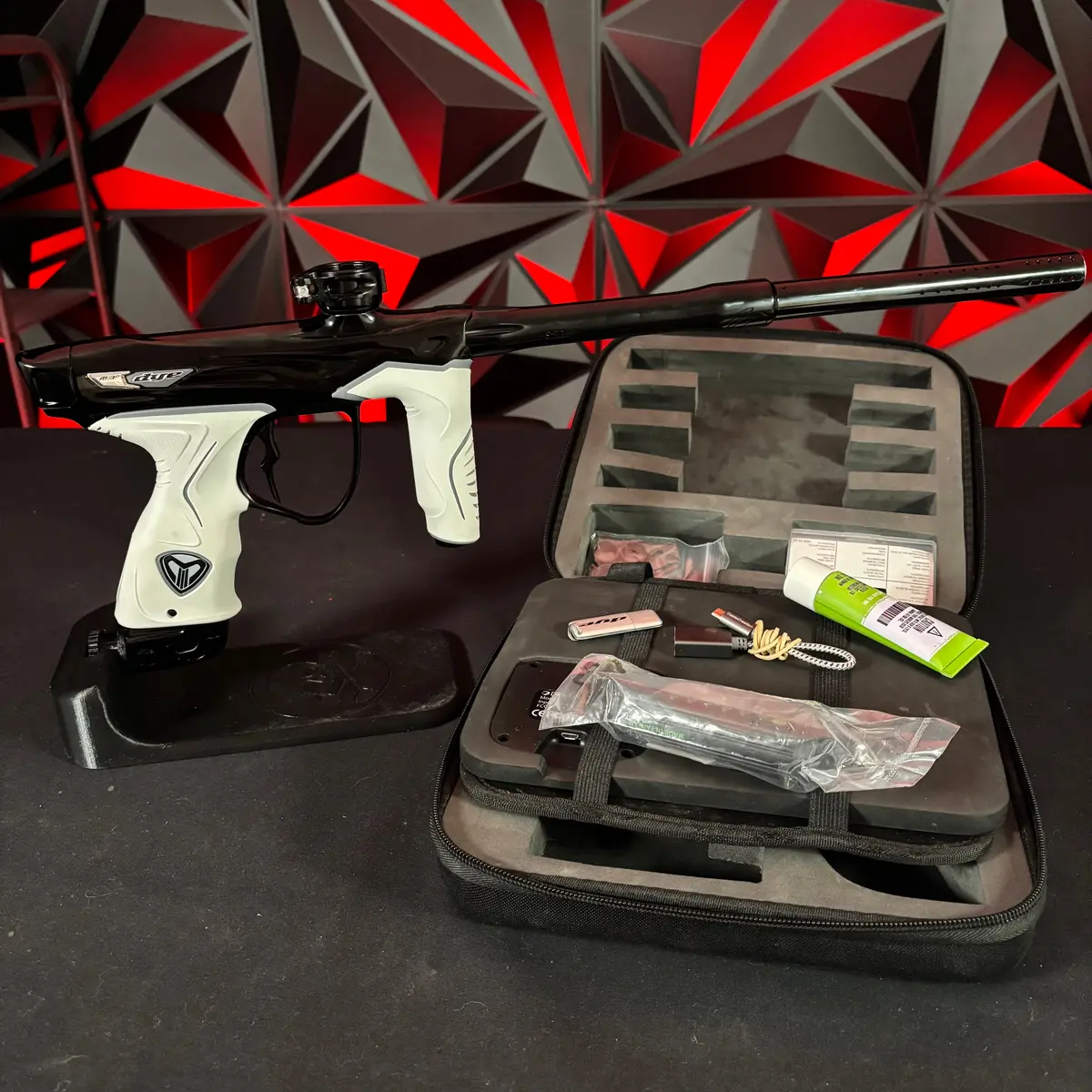 Used Dye M3+ Paintball Gun - Lights Out W/Mosair Wireless Charging Pad & White/Grey Grip Kit 1