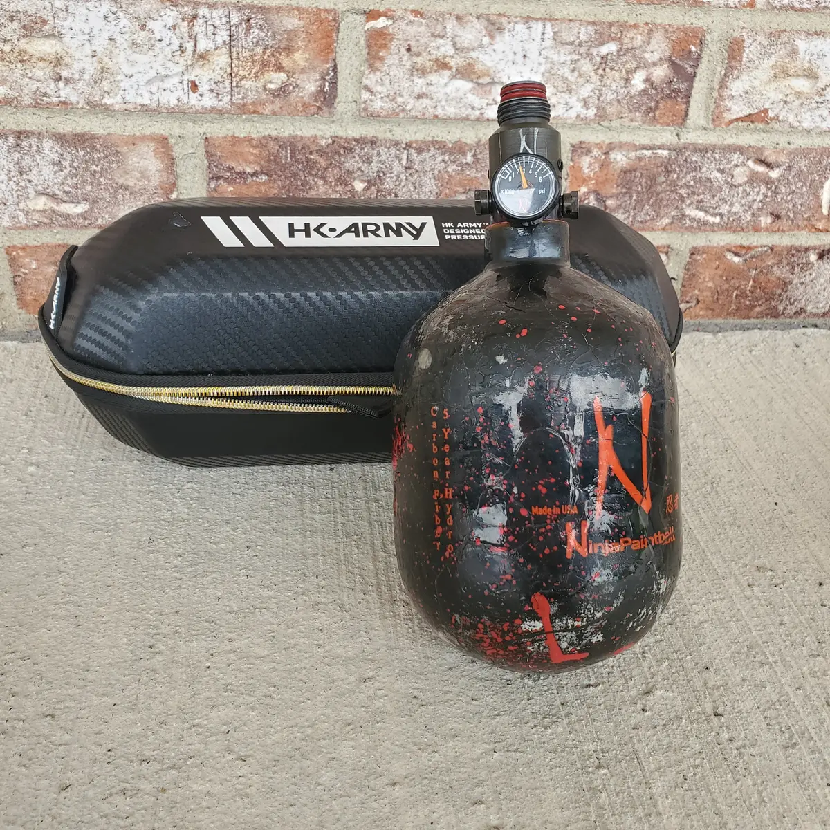 Used Ninja 48/4500 Paintball Tank- Black / Red Splash 1