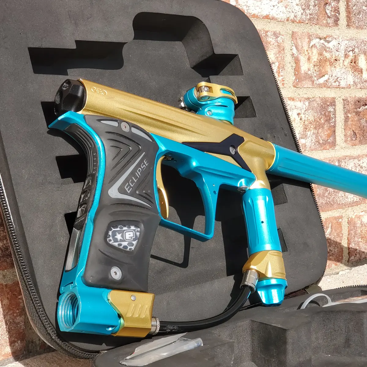 Used Planet Eclipse Geo 3 Paintball Gun Gold / Teal 1