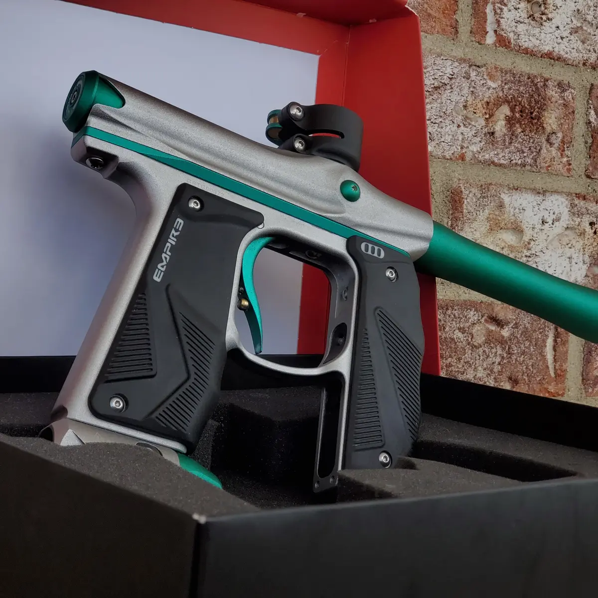 Used Empire Mini Gs Paintball Gun- Silver / Aquamarine 1