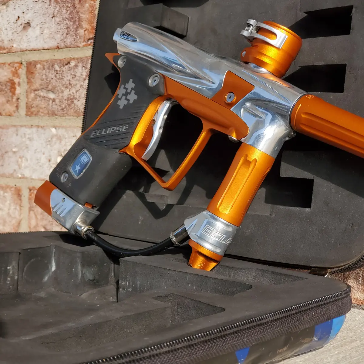 Used Planet Eclipse Geo 2.1 Paintball Gun - Chrome / Orange 1