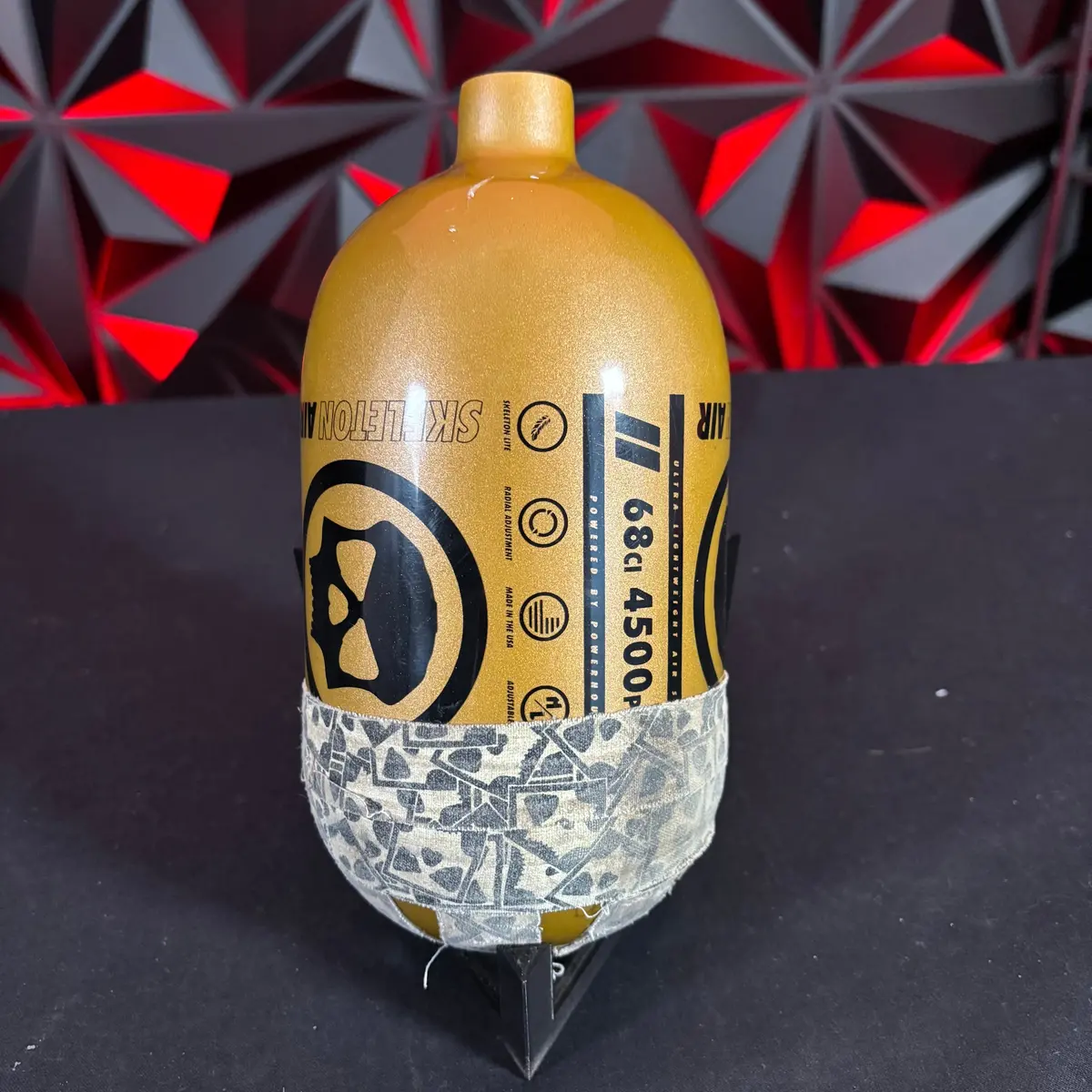 Used Infamous "Skeleton Air" Hyperlight 68/4500 Paintball Tank - Gold/Black 1
