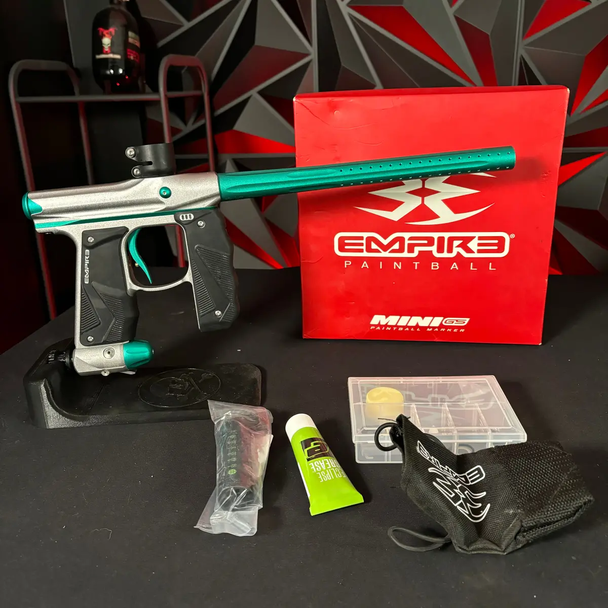 Used Empire Mini Gs Paintball Gun- Silver/Aquamarine 1