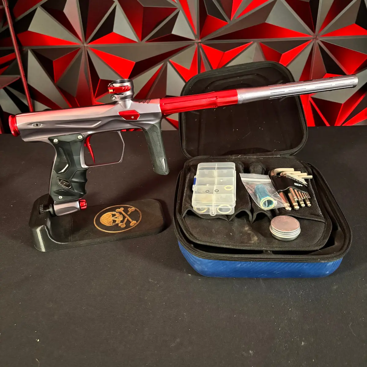 Used Shocker Amp Paintball Gun - Pewter/Red W/Freak Xl Silencio Barrel System & Ssc Bolt 1