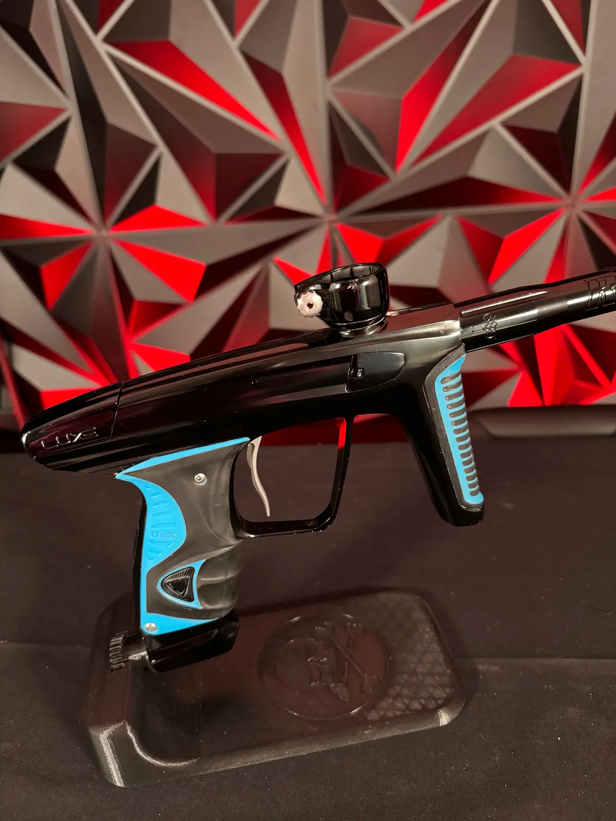 Used Dlx Luxe X Paintball Gun - Black W/ Blue Grips 1
