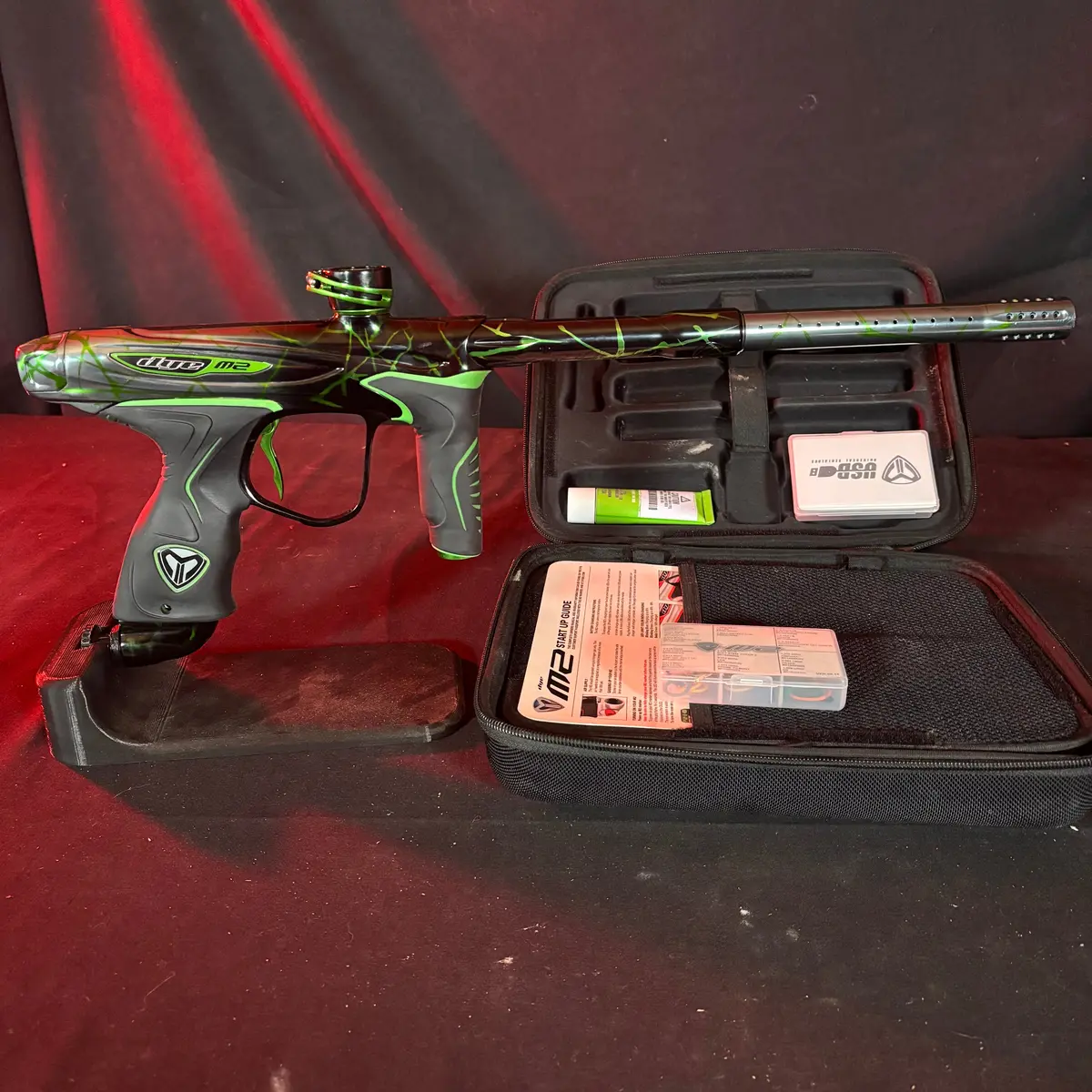 Used Dye M2 Mosair Paintball Gun - Polished Black/Green Splash 1