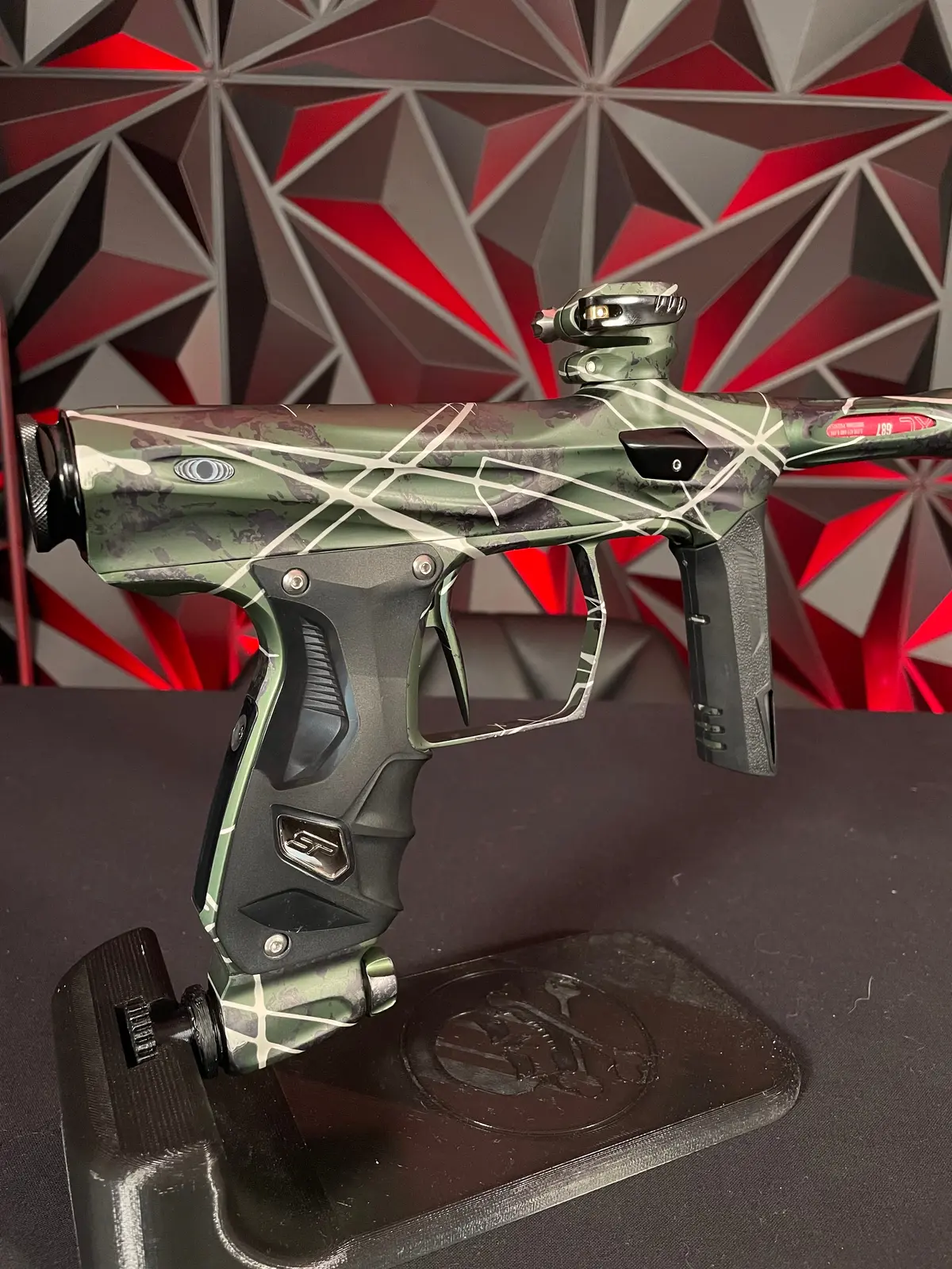 Used Shocker Amp Paintball Gun - Olive/Black/White Splash 1
