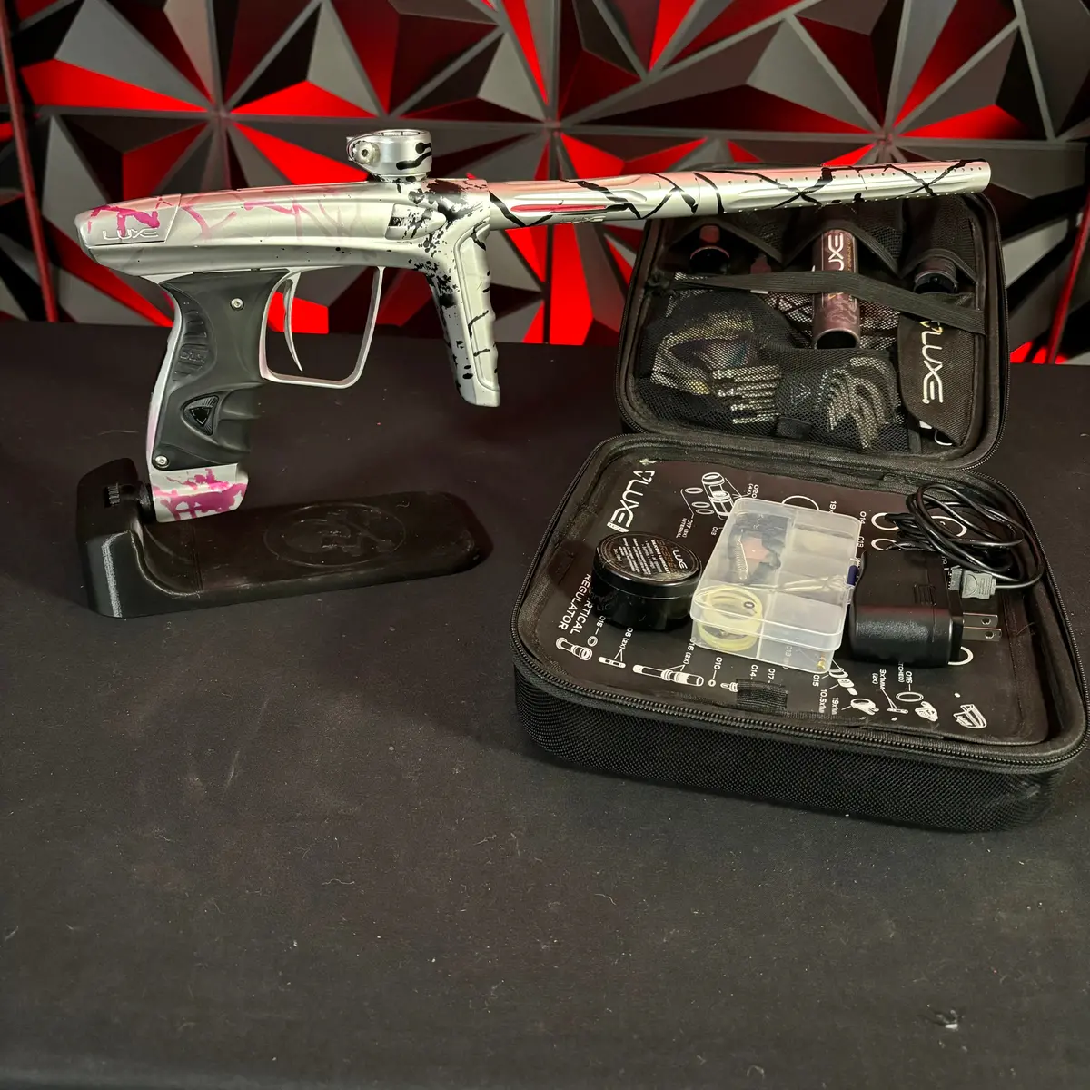Used Dlx Luxe Ice Paintball Gun - Silver/Pink And Black Splash #1 Of 15 W/Encore Bolt, Adrenaline Asa, 3 Triggers, And Extra Grip Plates 1