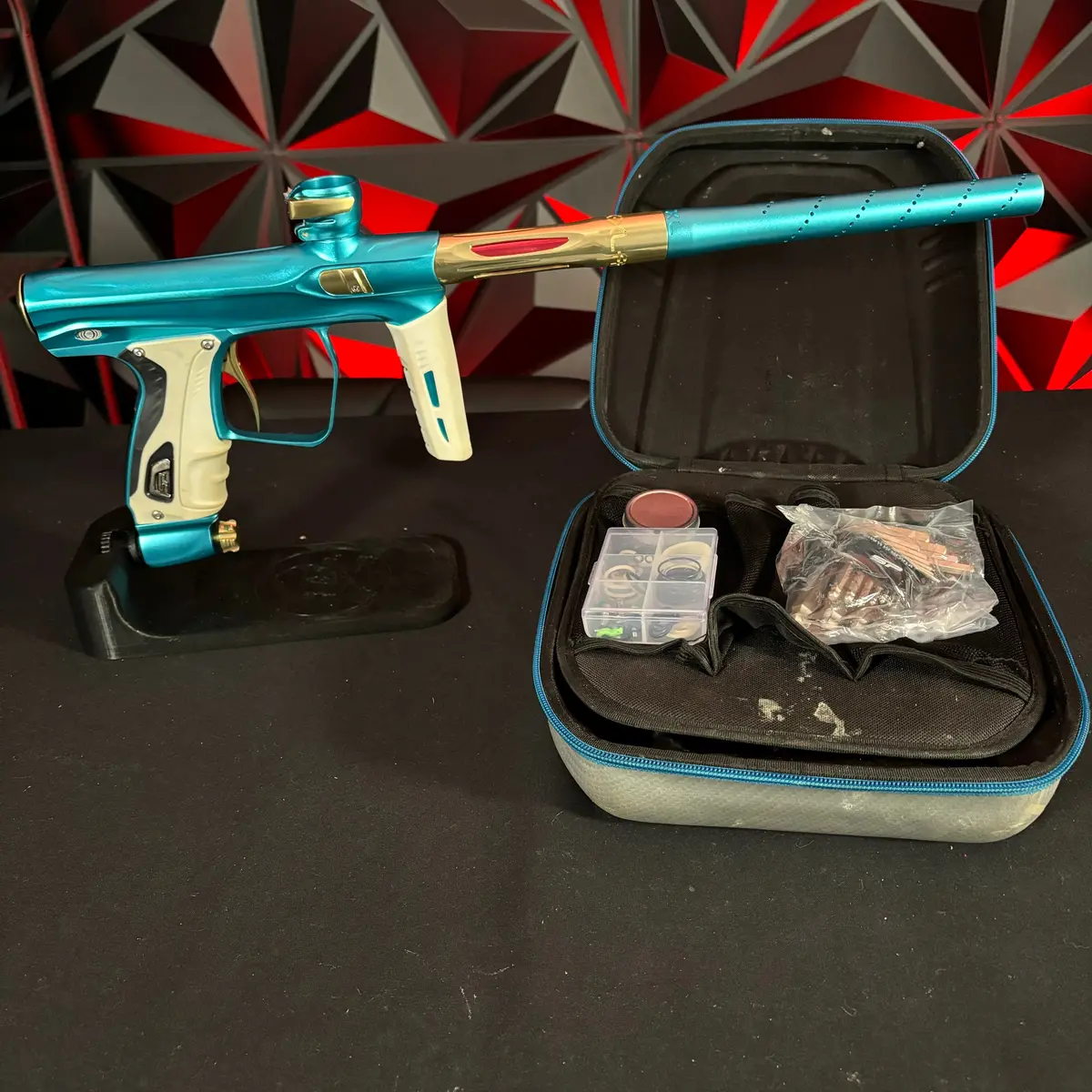 Used Shocker Xls Paintball Gun - Teal/Gold 1