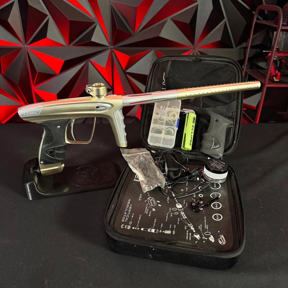 Used Dlx Luxe Ice Paintball Gun - Dust Gold/Silver W/ Deuce Trigger, Rubber Front & Back Grip, & Extra Battery 1