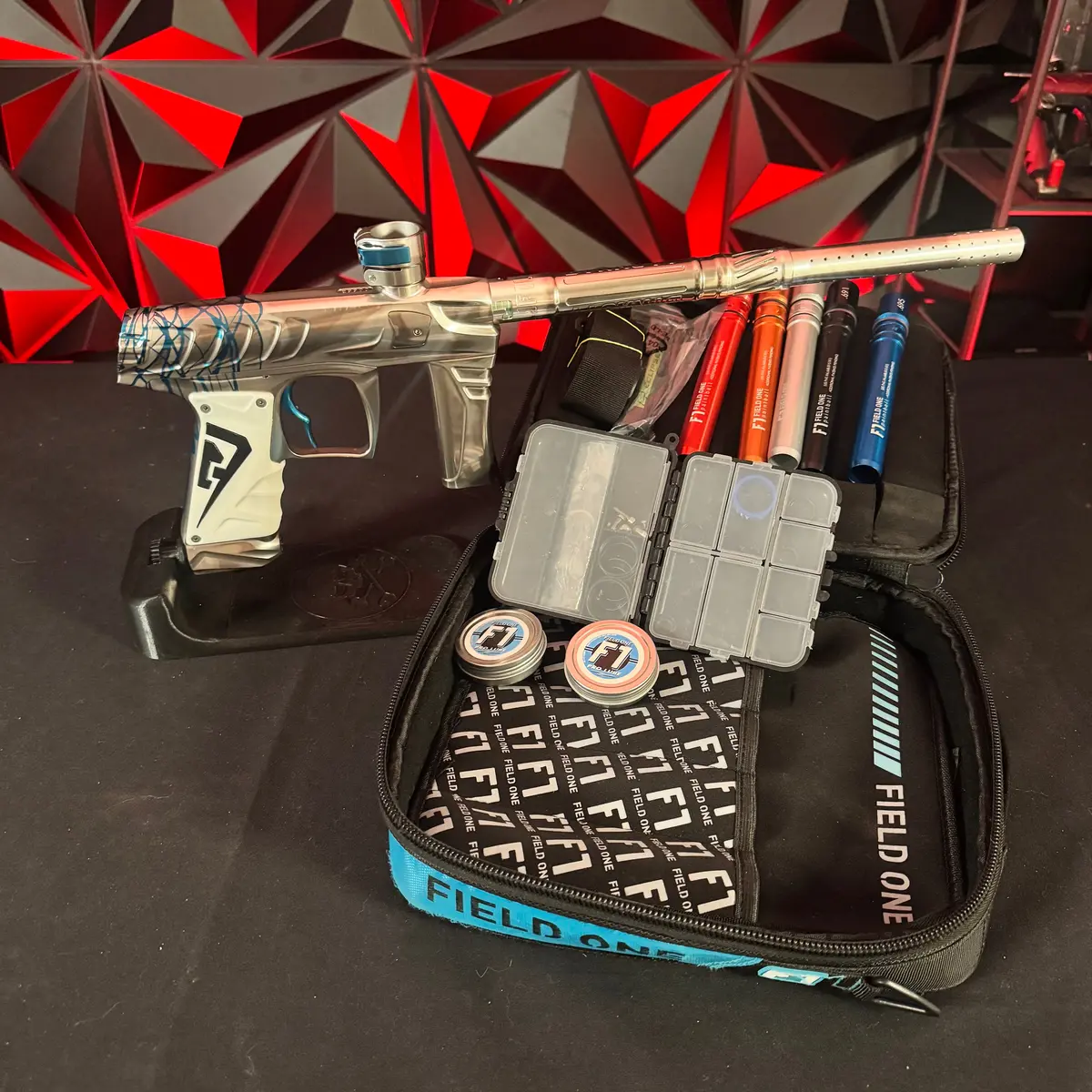 Used Field One Force Paintball Gun - Polished Silver W/Blue Splash & 6 Acculock Inserts 1