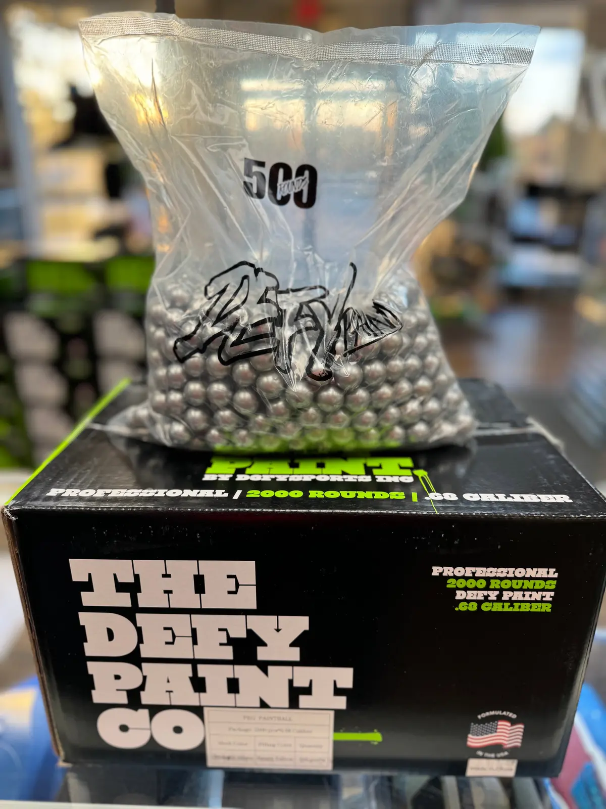 Defy Professional Grade Paintballs - 0.68 Caliber - 2000 Count - Metallic Silver Shell / Yellow Fill 1
