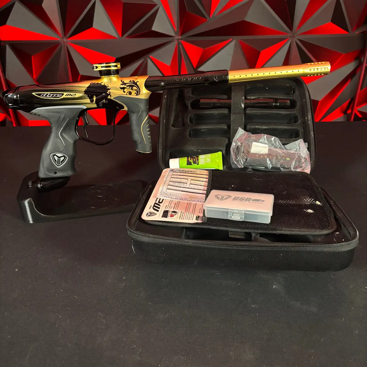 Used Dye M2 Mosair Paintball Gun - Polished Gold/Black Knight 1