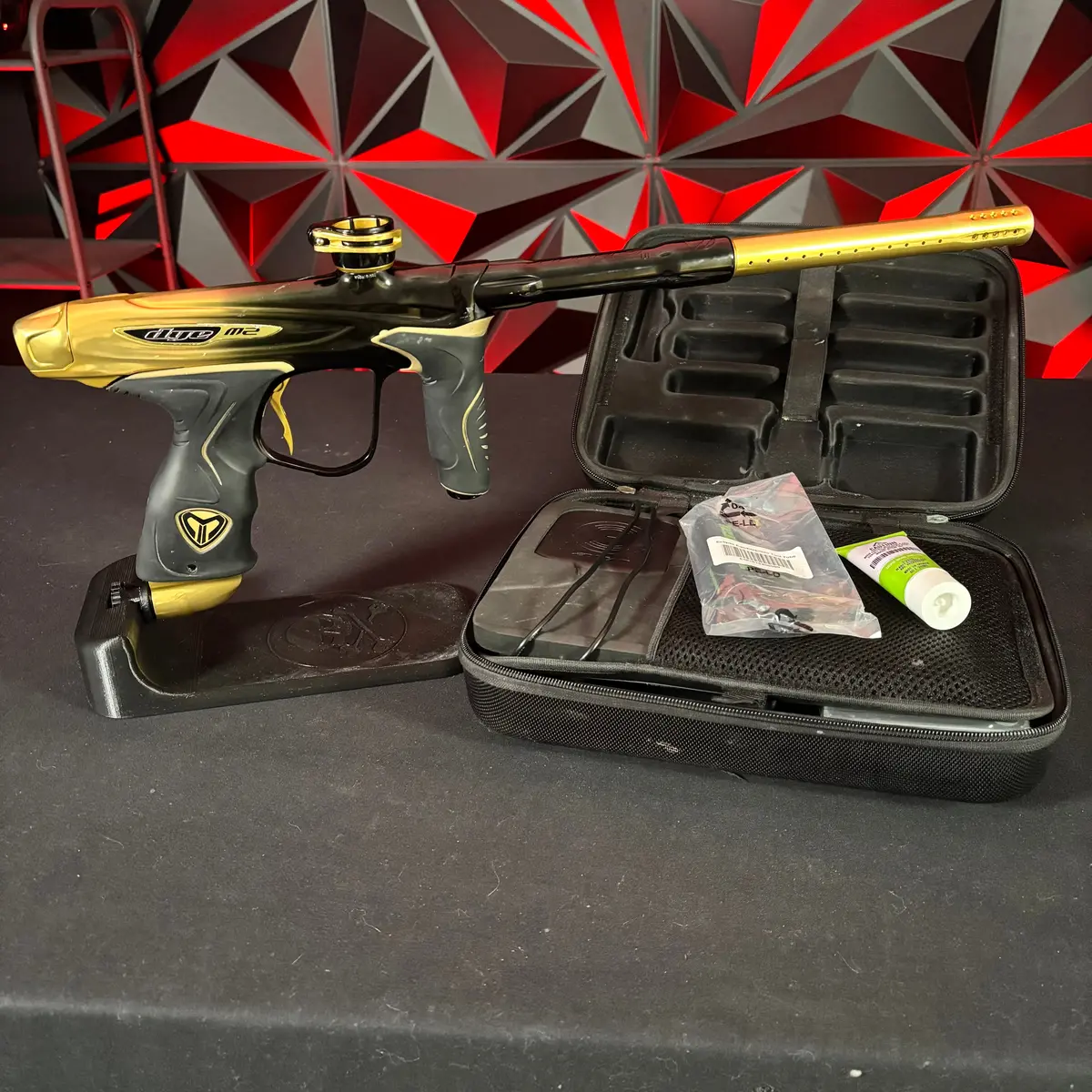 Used Dye M2 Mosair Paintball Gun - Polished Black/Green Splash 1
