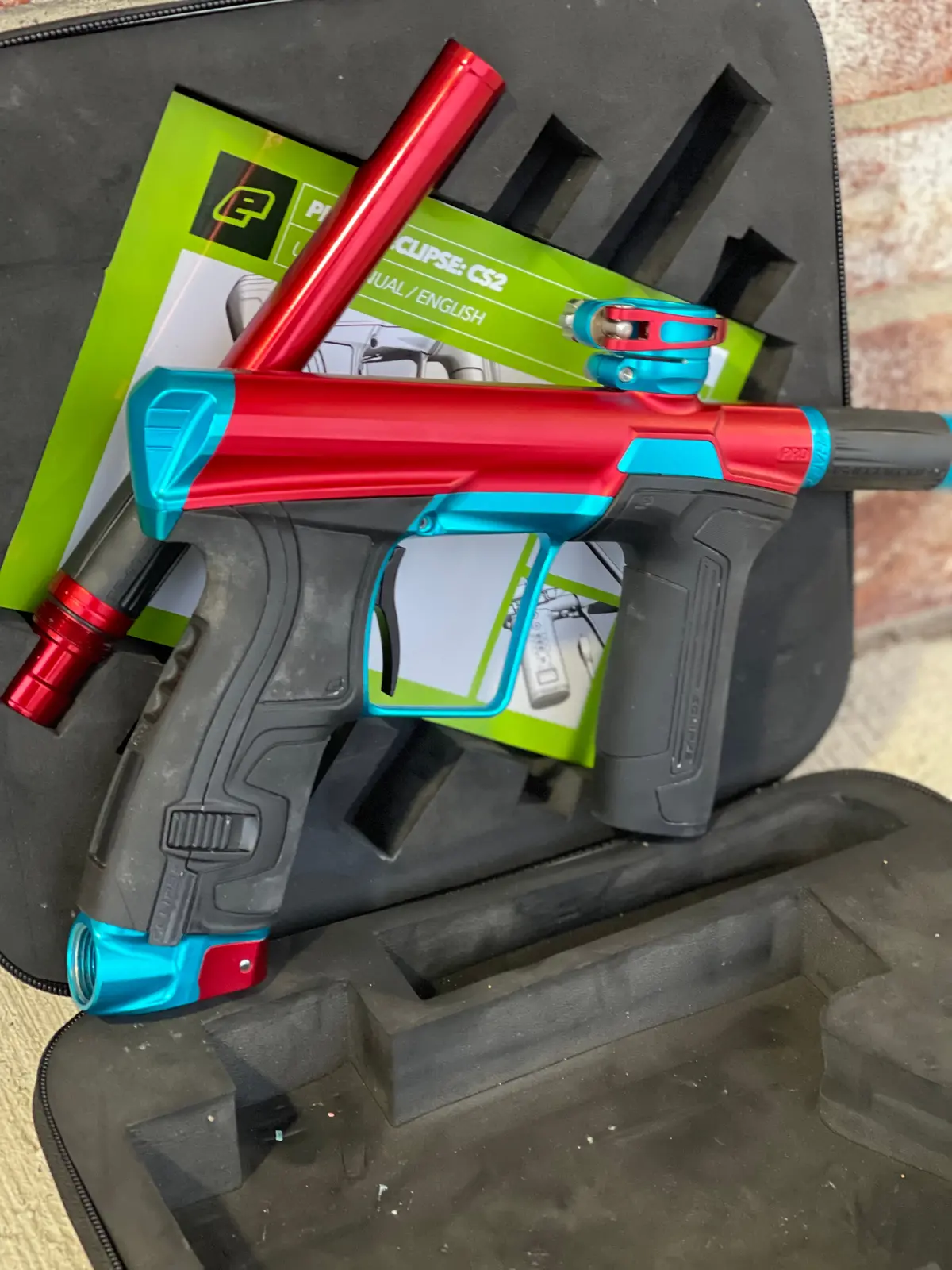 Used Planet Eclipse Cs2 Pro Paintball Gun - Red/Teal 1