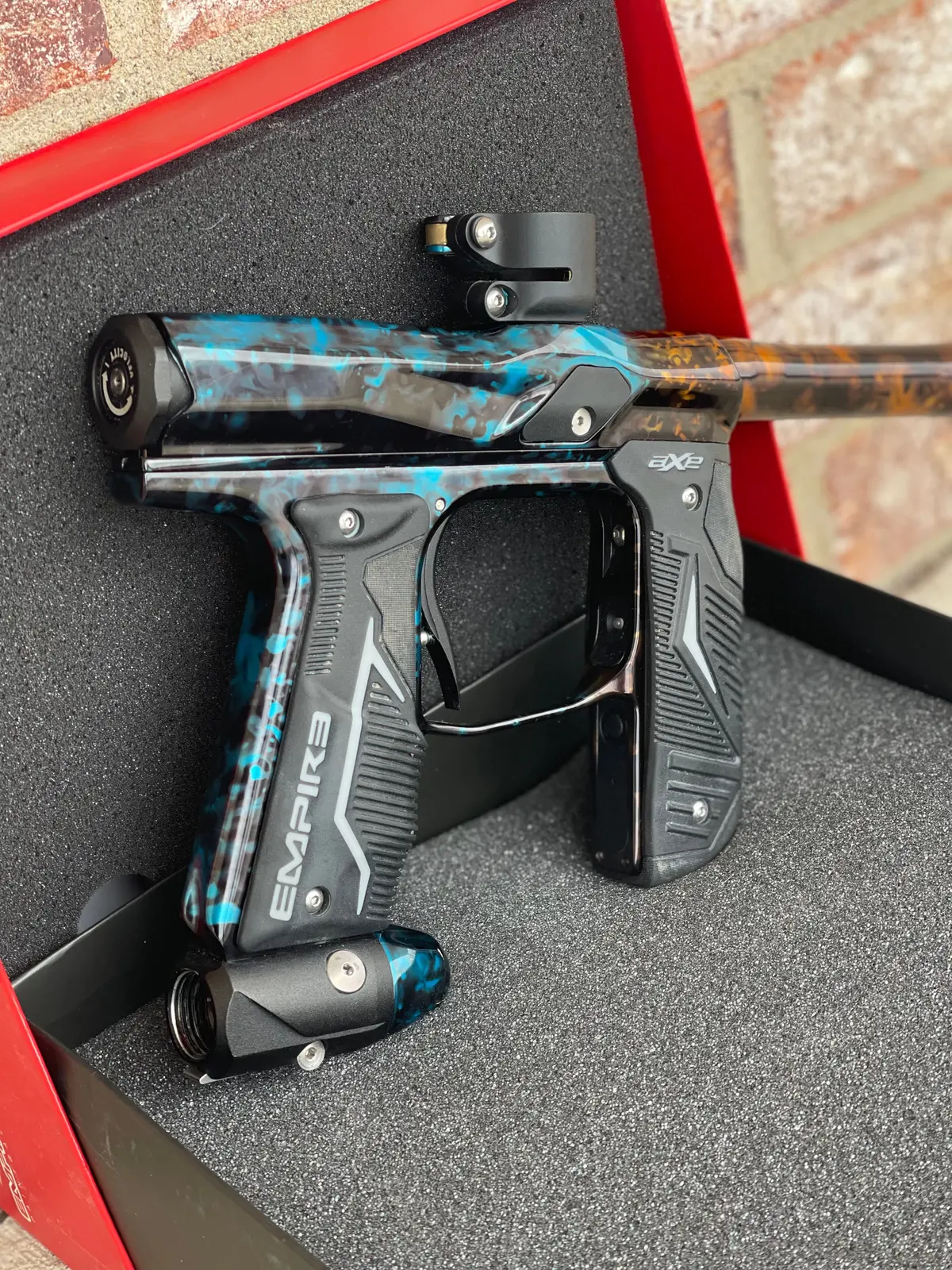 Used Empire Axe 2.0 Paintball Gun - Acid Wash Custom Anno  (Orange Teal) 1