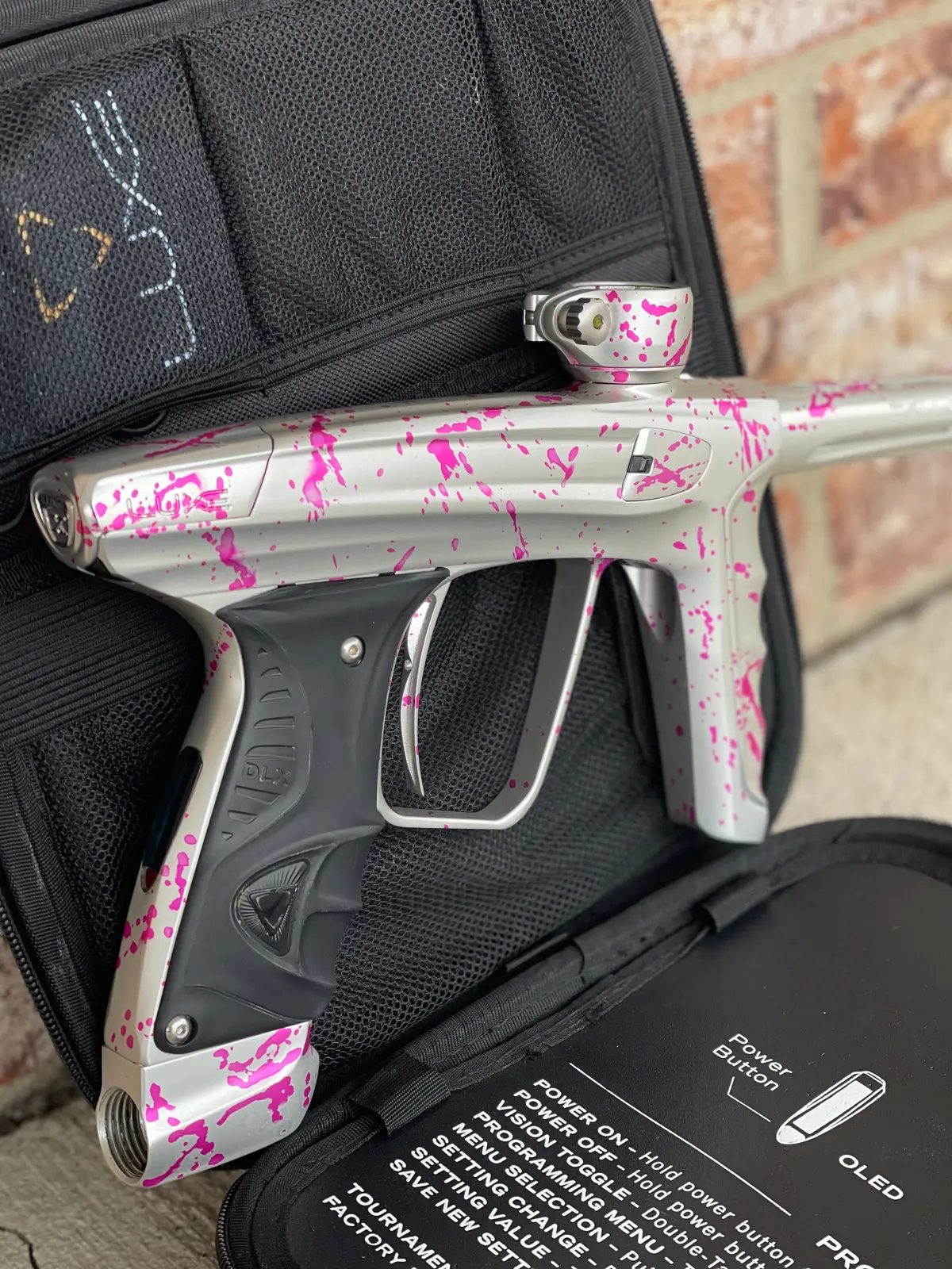 Used Dlx Luxe X Paintball Gun - Silver Pink Splash 1