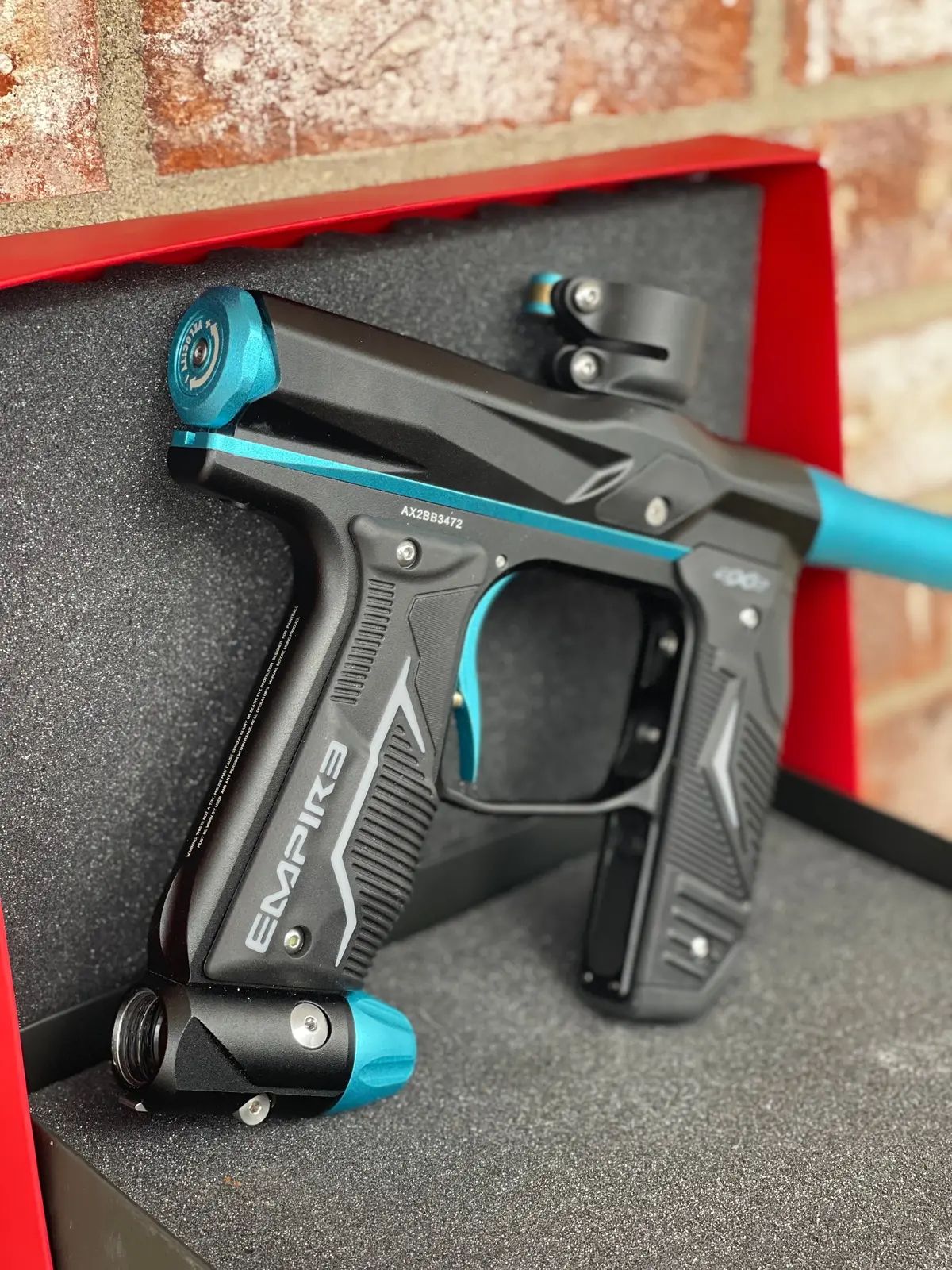 Used Empire Axe 2.0 Paintball Gun - Black W/Teal Accents 1