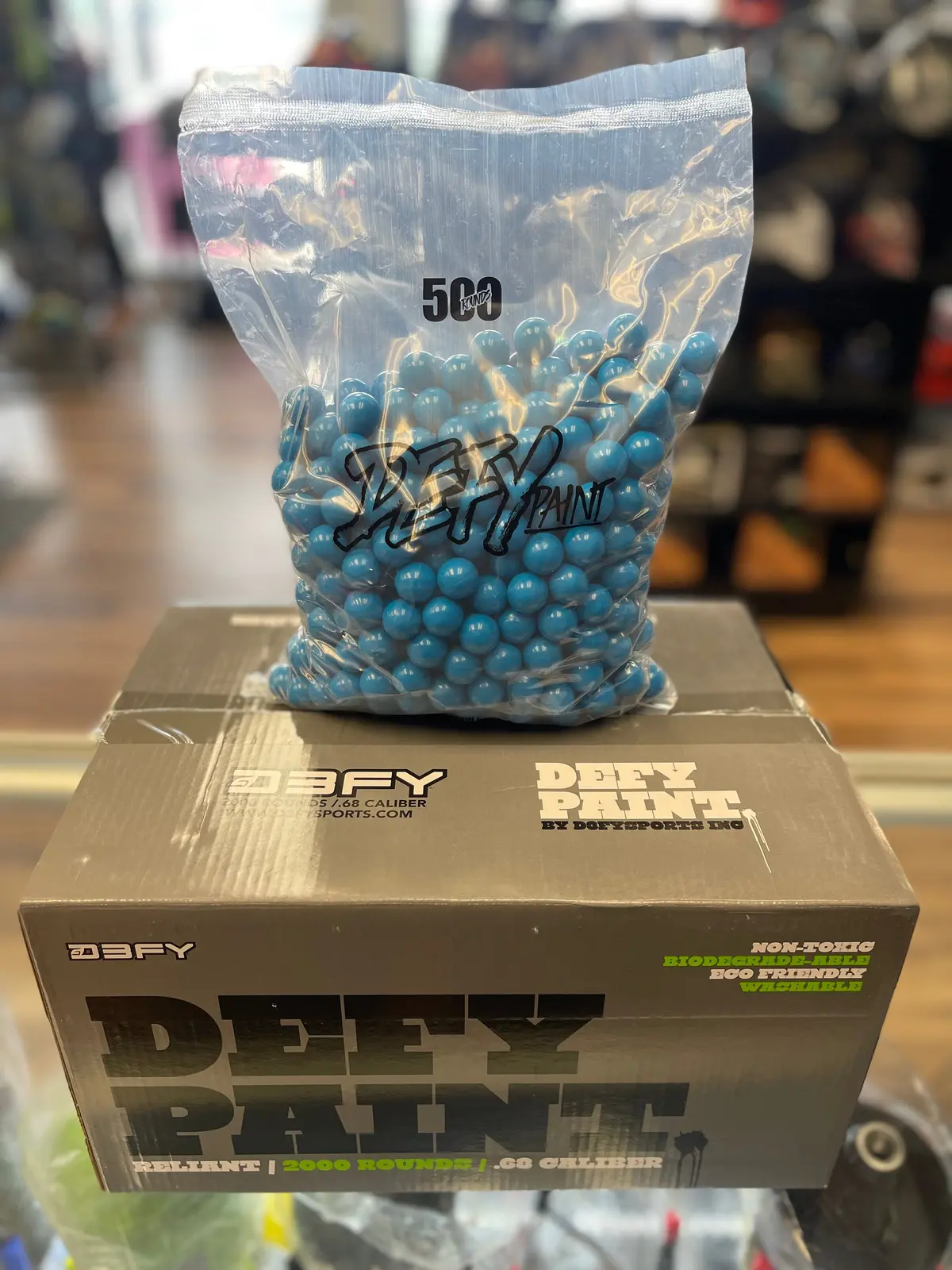 Defy Reliant Paintballs - 0.68 Caliber - 2000 Count - Bright Blue Shell / Neon Green Fill 1