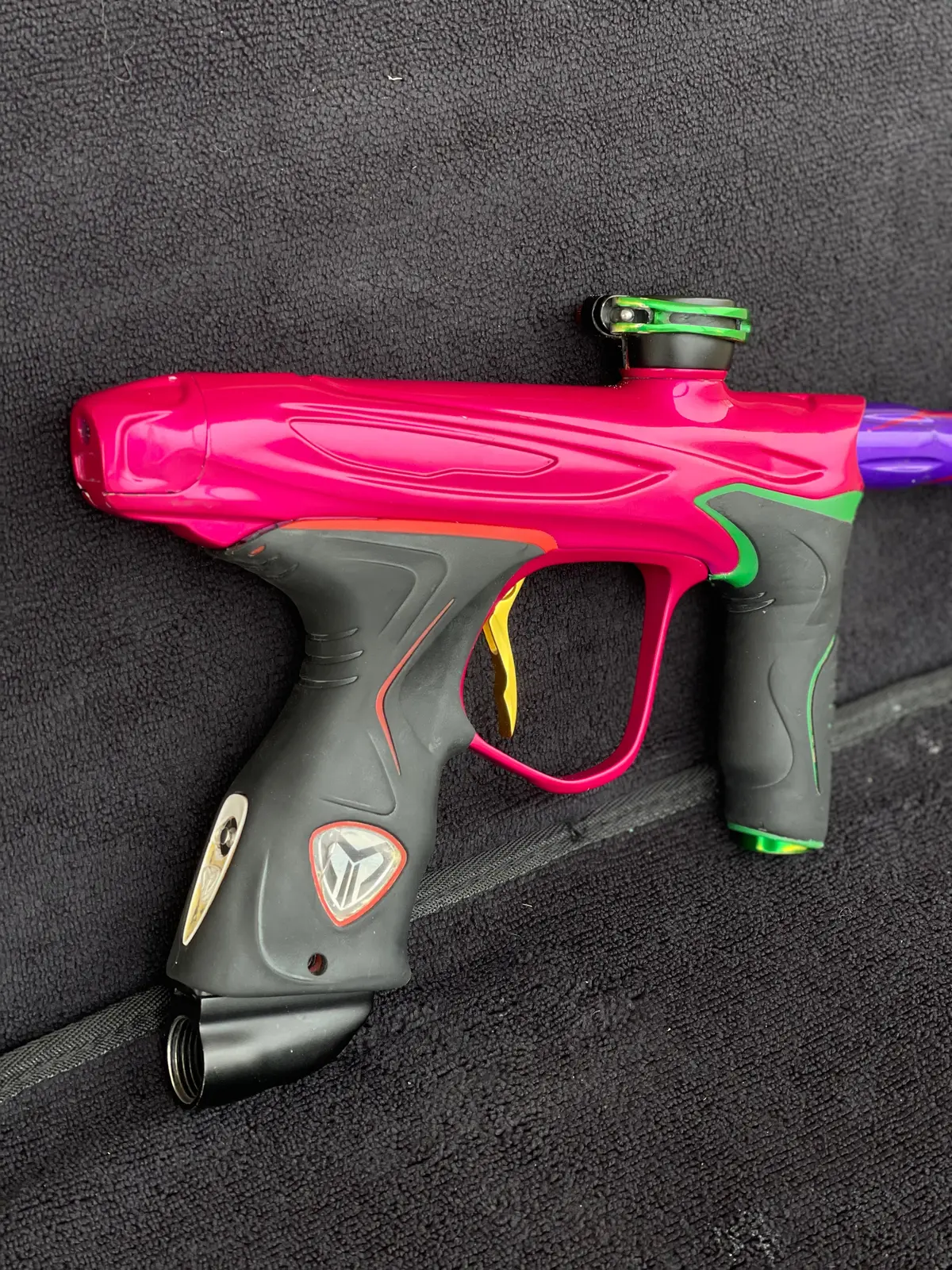 Used Dye M2 Paintball Gun - Pink/Purple/Black/Gold (Spray Paint Collage) 1