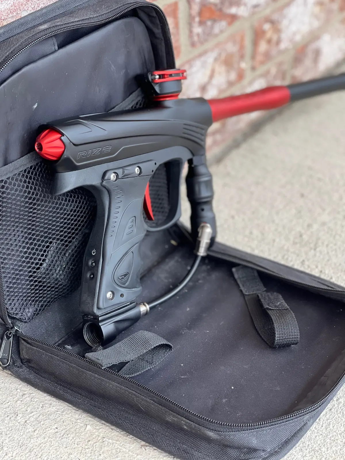 Used Dye Rize Maxxed Paintball Gun - Black With Red 1