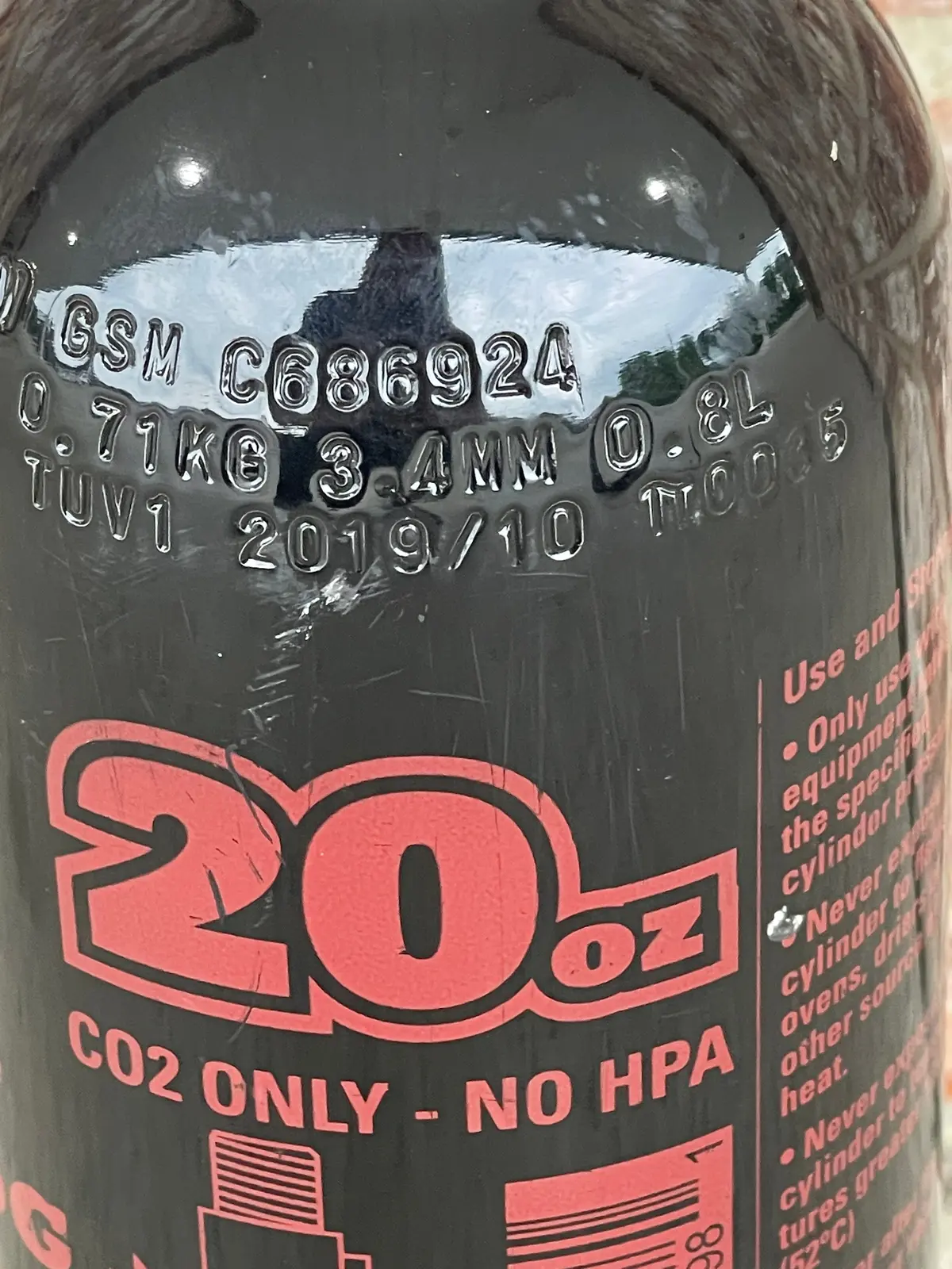 Used Maddog 20 Ounce Co2 Paintball Tank 1