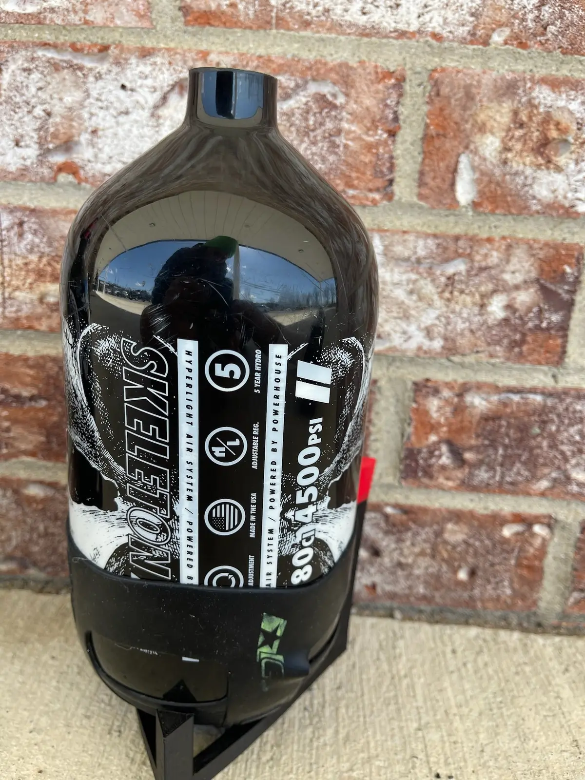 Used Infamous Savage Skull 80/4500 Paintball Tank- Black/White - Bottle Only - Exalt/Pe Tank Grip 1