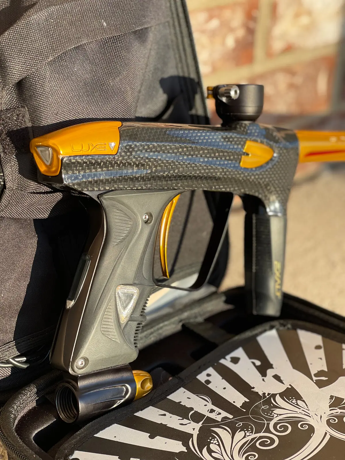 Used Dlx Luxe 2.0 Oled Paintball Gun - Carbon / Gold 1