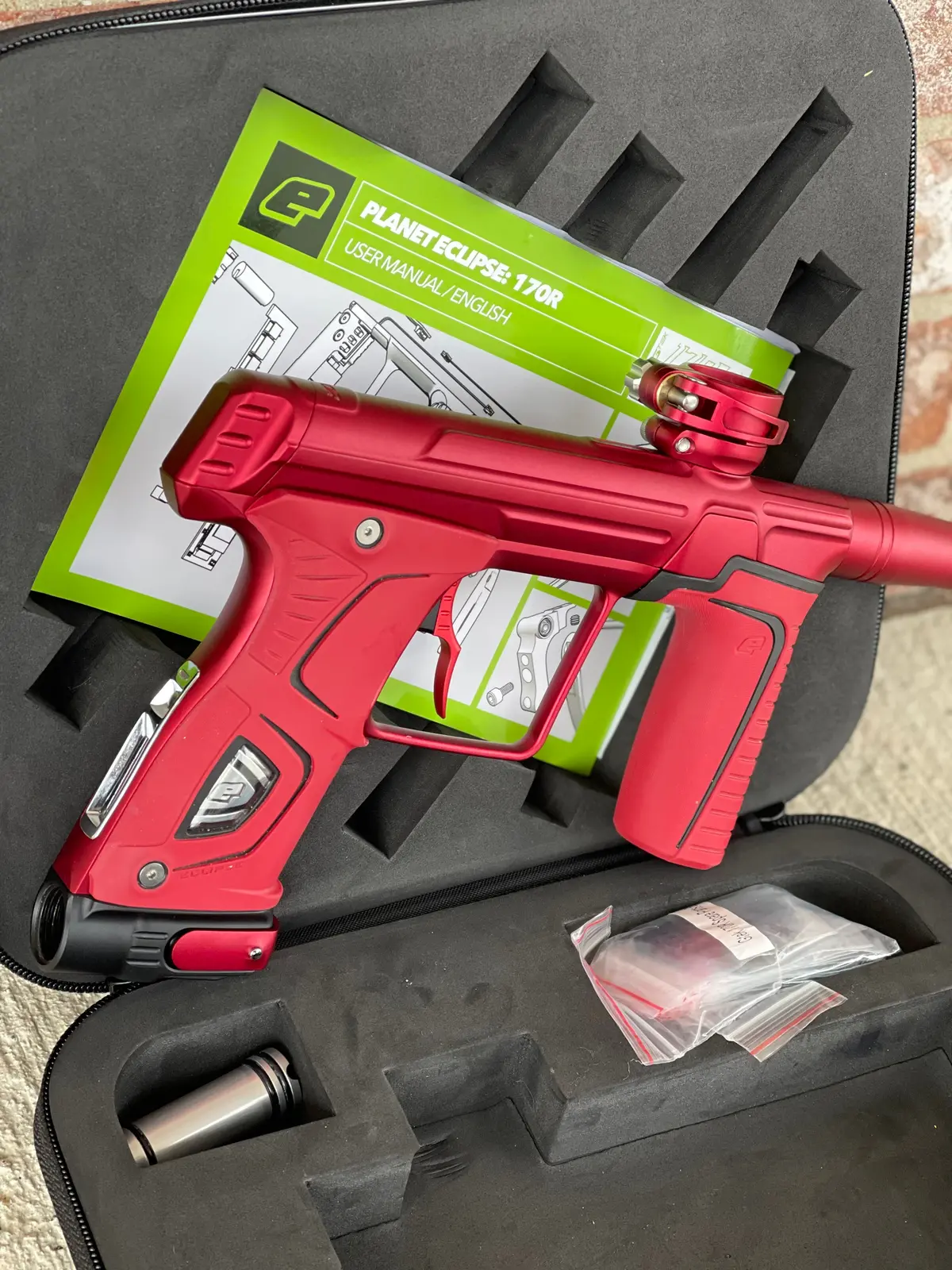 Used Planet Eclipse 170R Paintball Gun - Dust Red W/Red Grip Kit, Deuce Trigger, And St3 Bolt 1