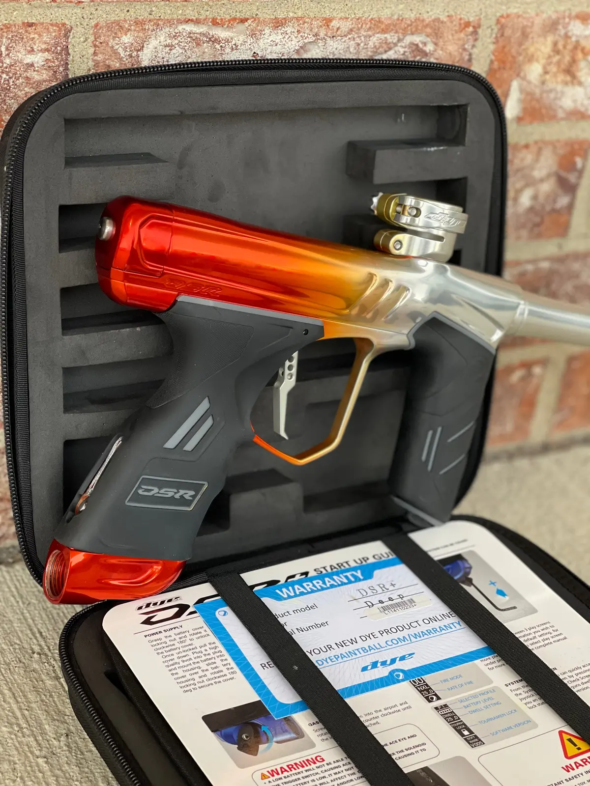 Used Dye Dsr+ Paintball Gun - Polished Orange/Silver Fade 1