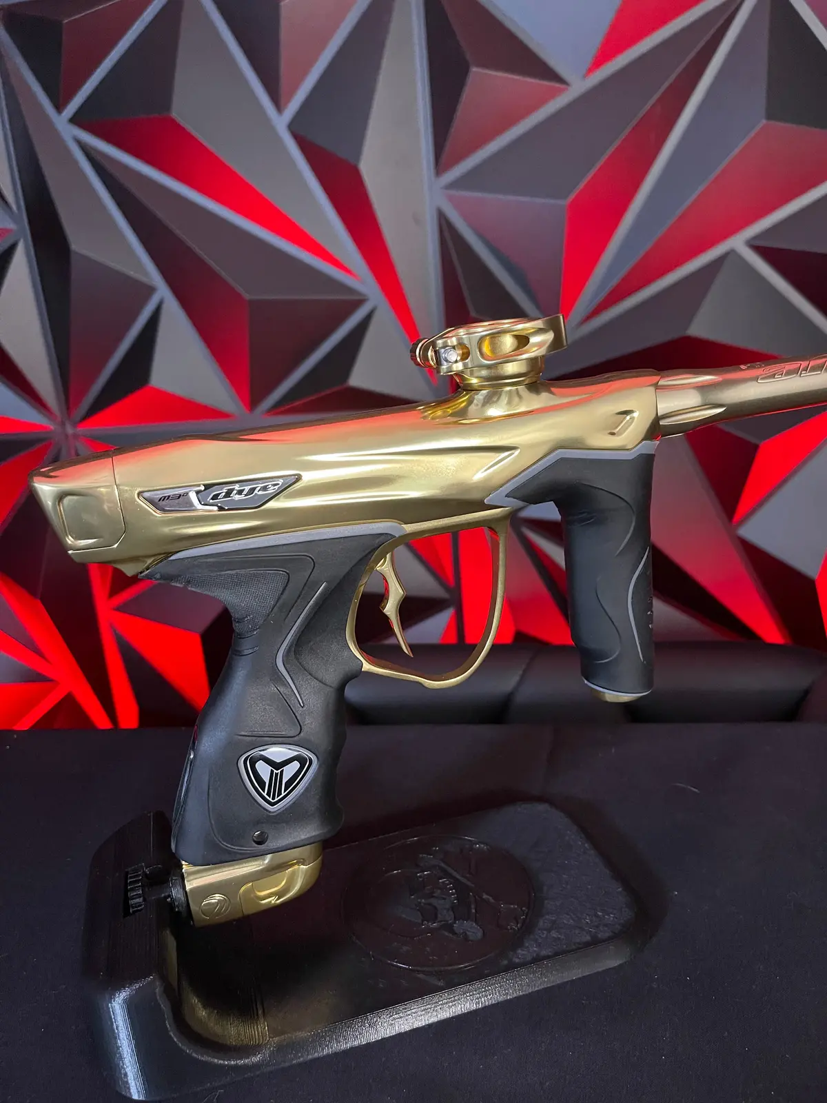 Used Dye M3+ Paintball Gun - 007 Polished Gold W/ Charging Pad 1