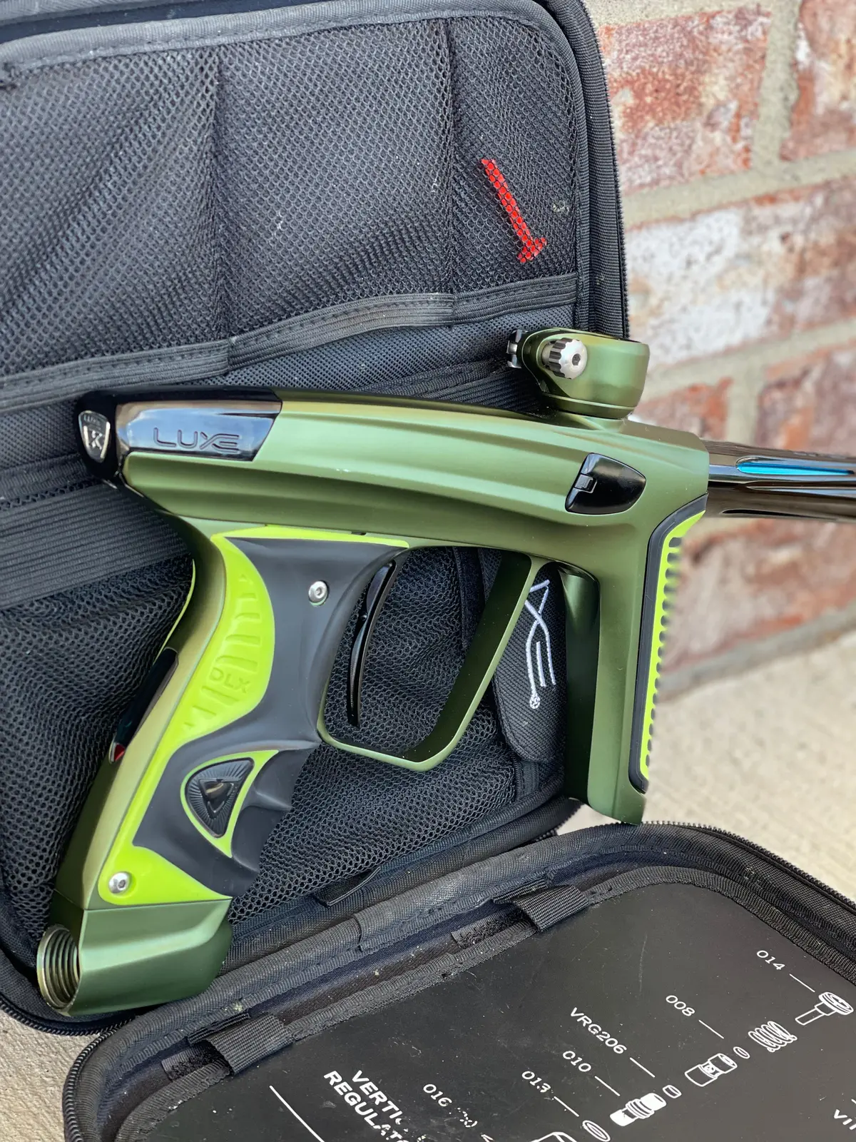 Used Dlx Luxe X Paintball Gun - Dust Olive/Polished Black W/ Green Grip Kit 1