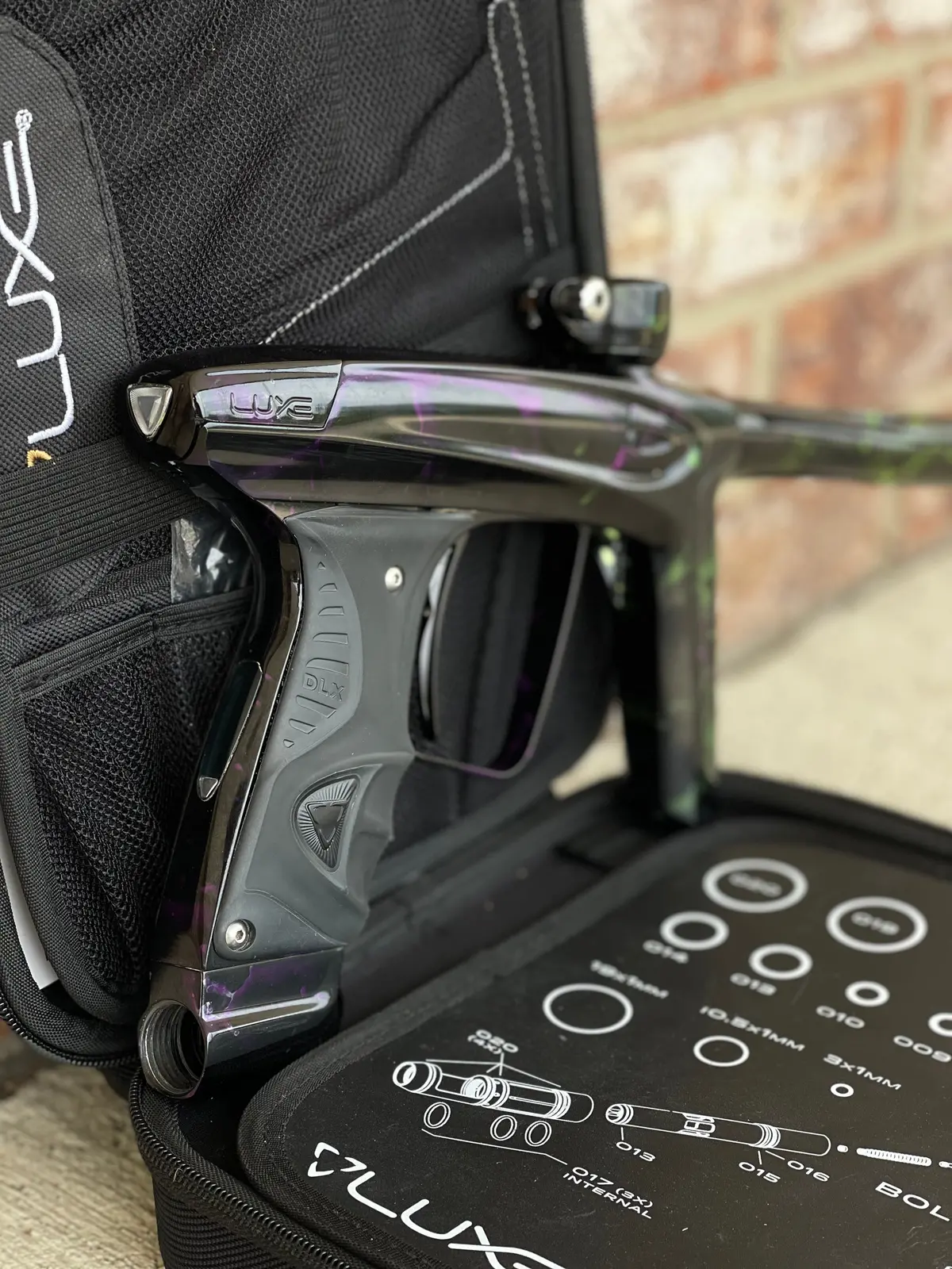 Used Dlx Luxe Ice Paintball Gun - Acid Wash Green / Purple 1