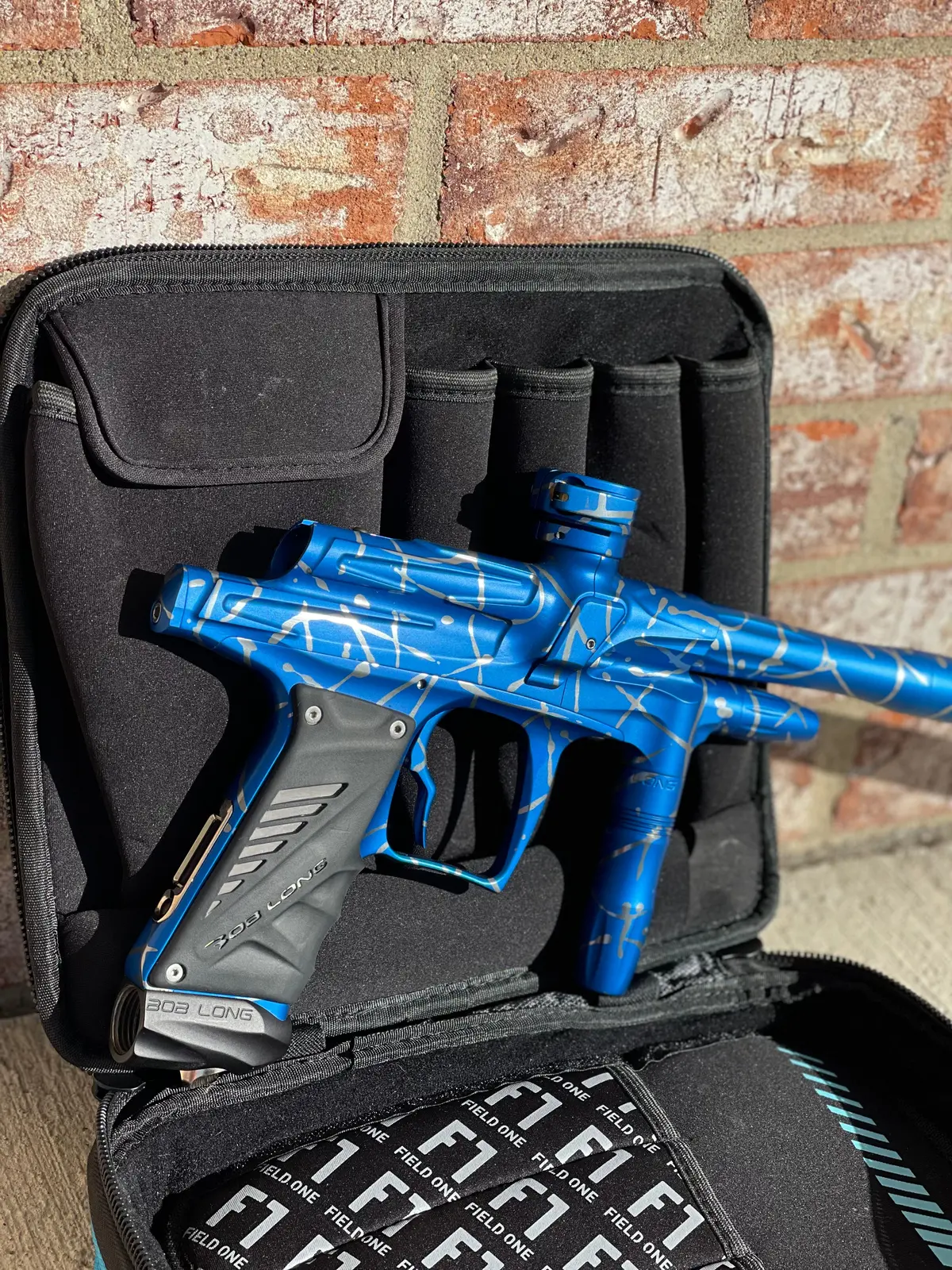 Used Bob Long G6r Oled Paintball Gun - Z Cut - Blue/Silver Splash 1